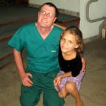 Dr. Bryan and a student at Hogar School and Orphanage